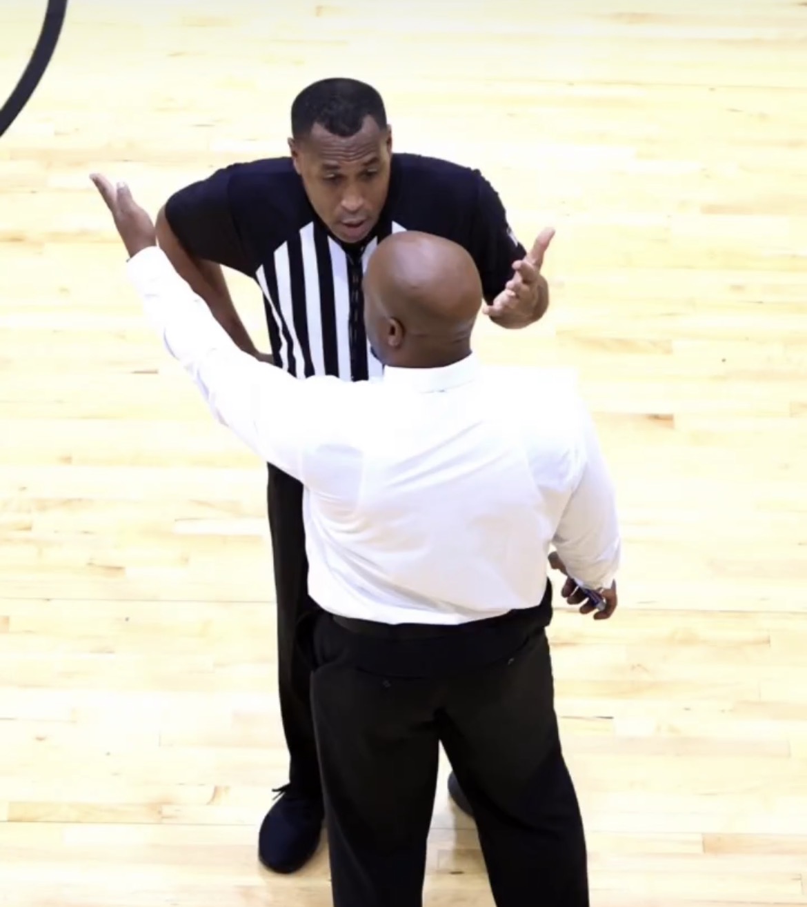 Coach Price making his case to the referee